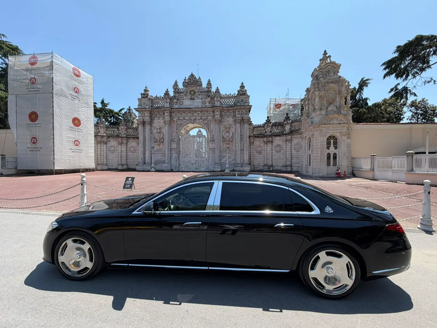 Chauffeur-driven Mercedes-Maybach at the Dolmabahçe Palace gate